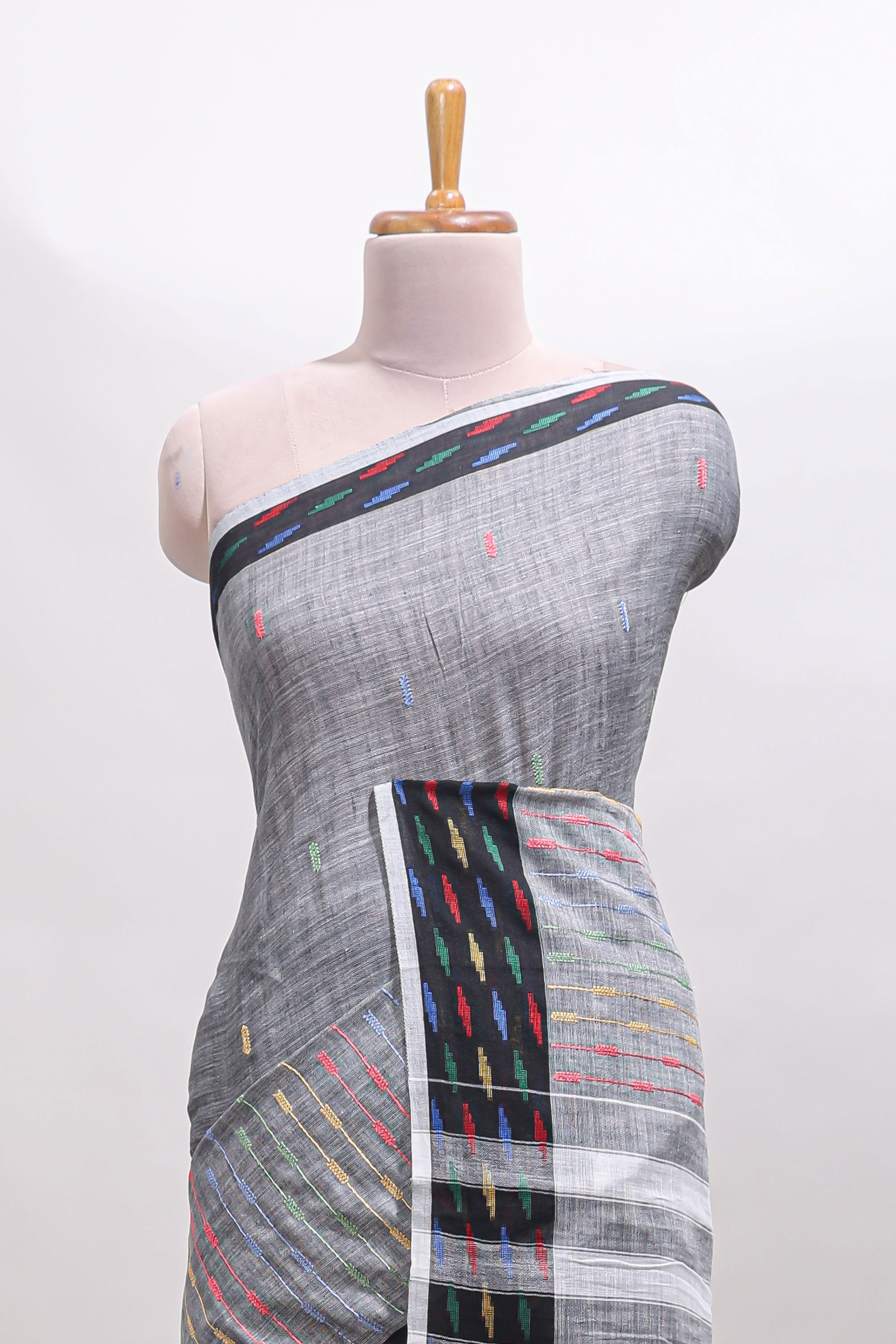 Grey thread butta linen cotton saree with contrast border and striped pallu