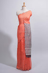 Orange linen cotton saree withsequin details striped and geometric zigzag pallu with scallop border along with striped blouse
