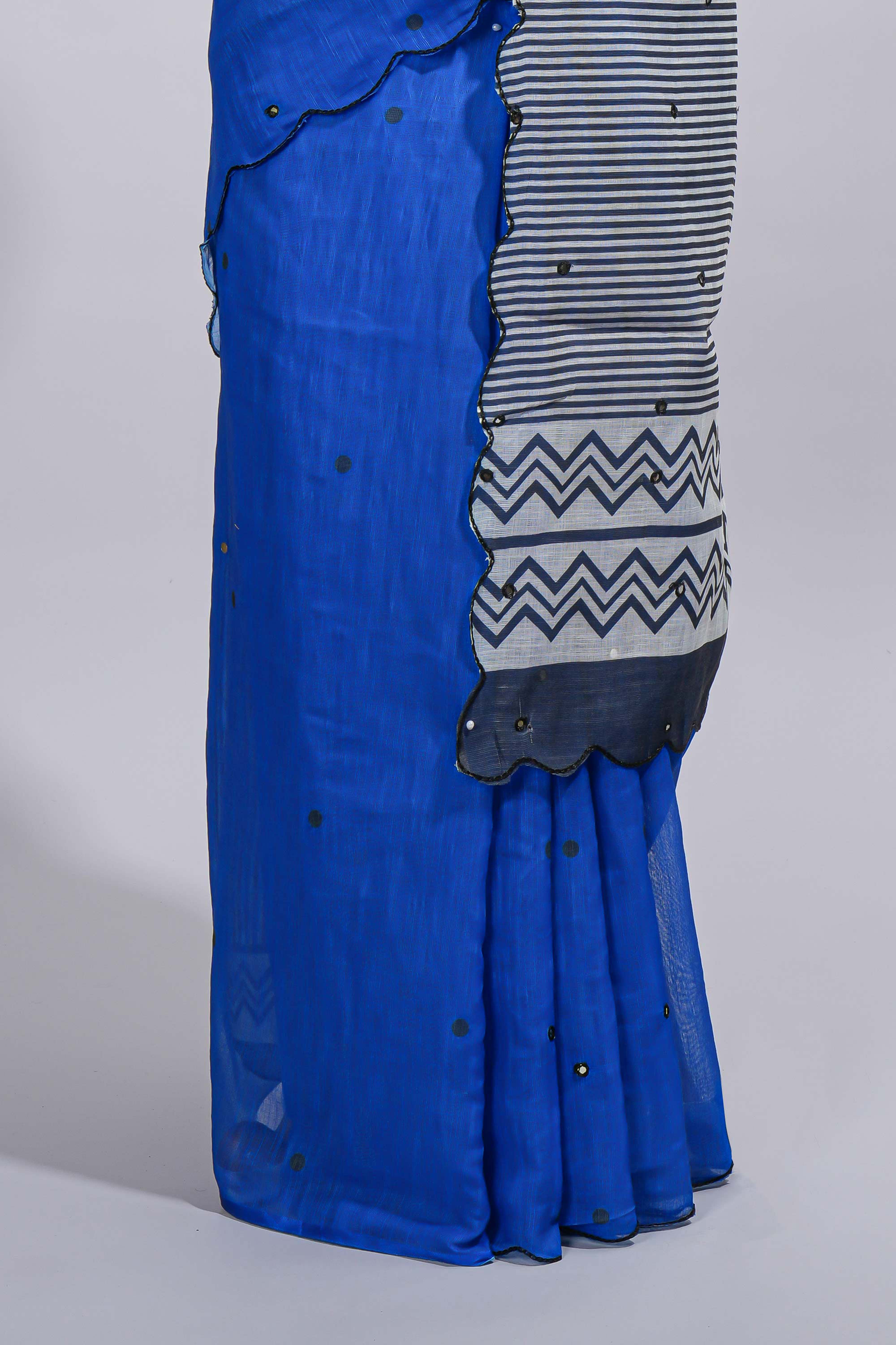 Royal blue linen cotton saree withsequin details striped and geometric zigzag pallu with scallop border along with striped blouse