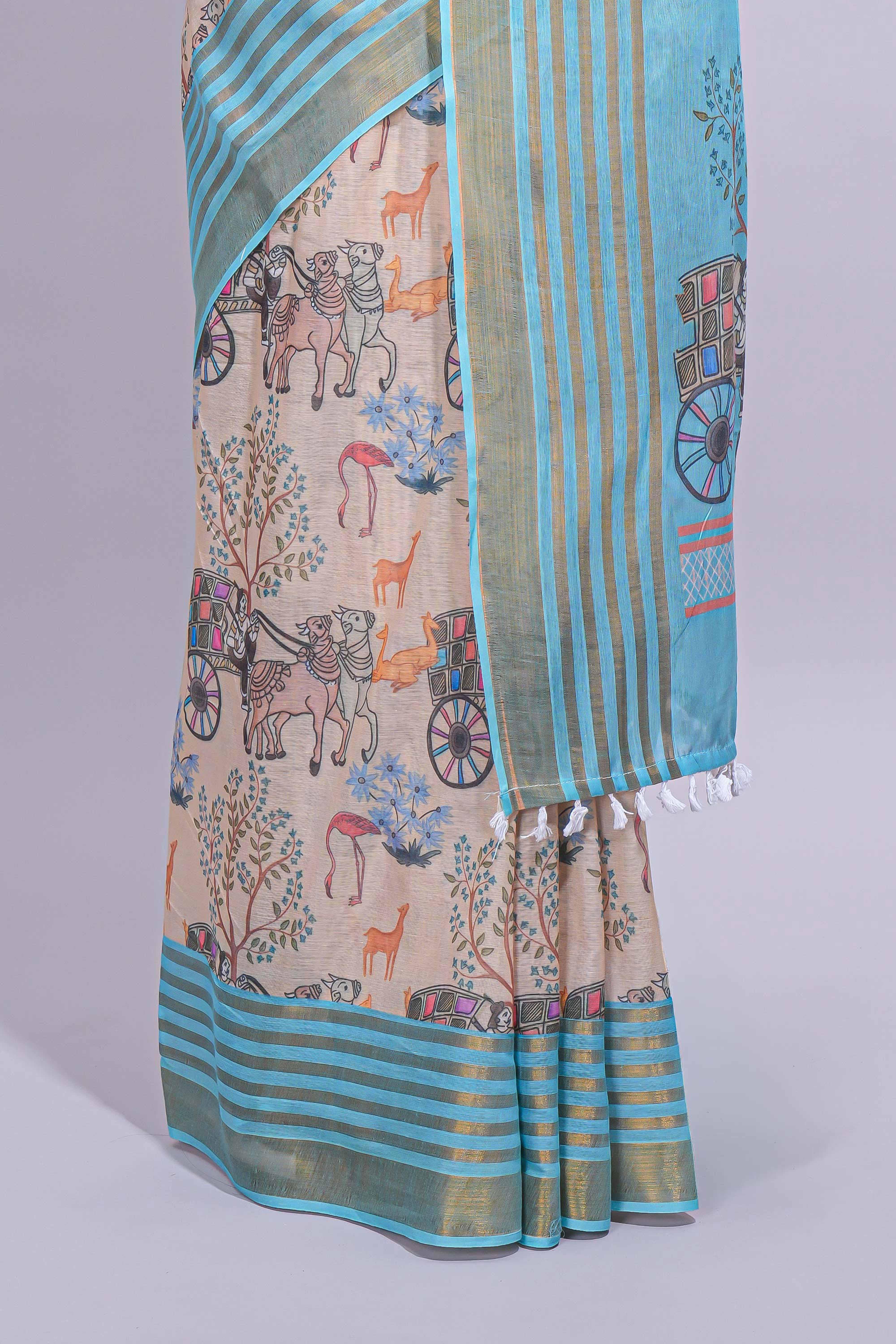 Pastel blue and beige linen cotton saree with animal motifs striped zari border and printed pallu with tassel along with contrast blouse