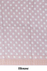 Ivory colour linen saree floral prints with pastel accents by a subtle gold zari border and printed pallu with tassel along with printed blouse