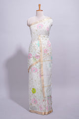 White linen saree floral prints with pastel accents by a subtle gold zari border andstriped pallu with tasselalong with self blouse