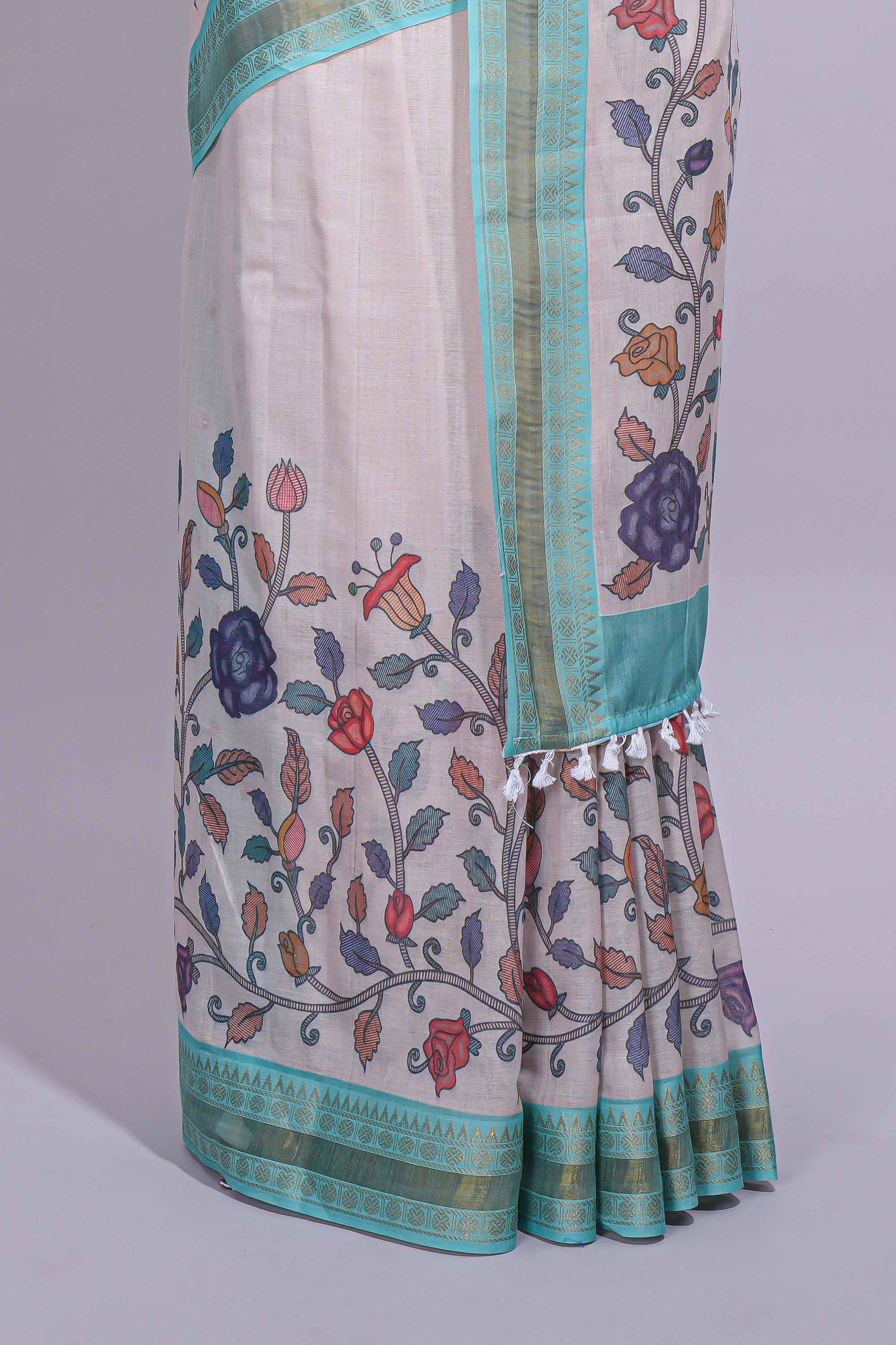 Elegant linen cotton saree with multicolourfloral vine print with a contrast border and printed pallu along with printed blouse