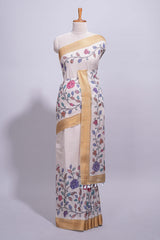 Ivory with yellow linen cotton saree with multicolourfloral vine print with a contrast border and printed pallu along with printed blouse