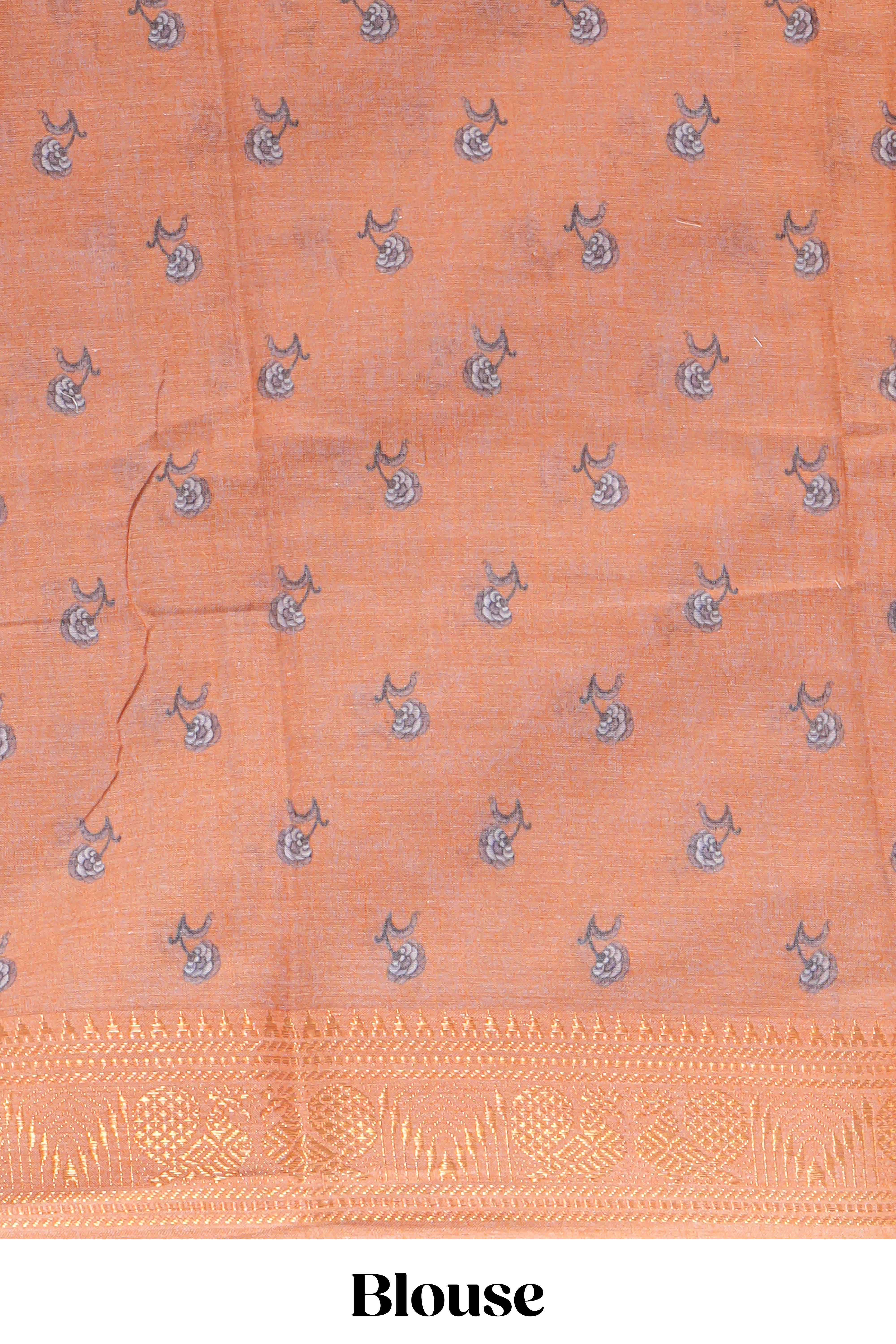White with orange linen cotton saree with multicolourfloral vine print with a contrast border and printed pallu along with printed blouse