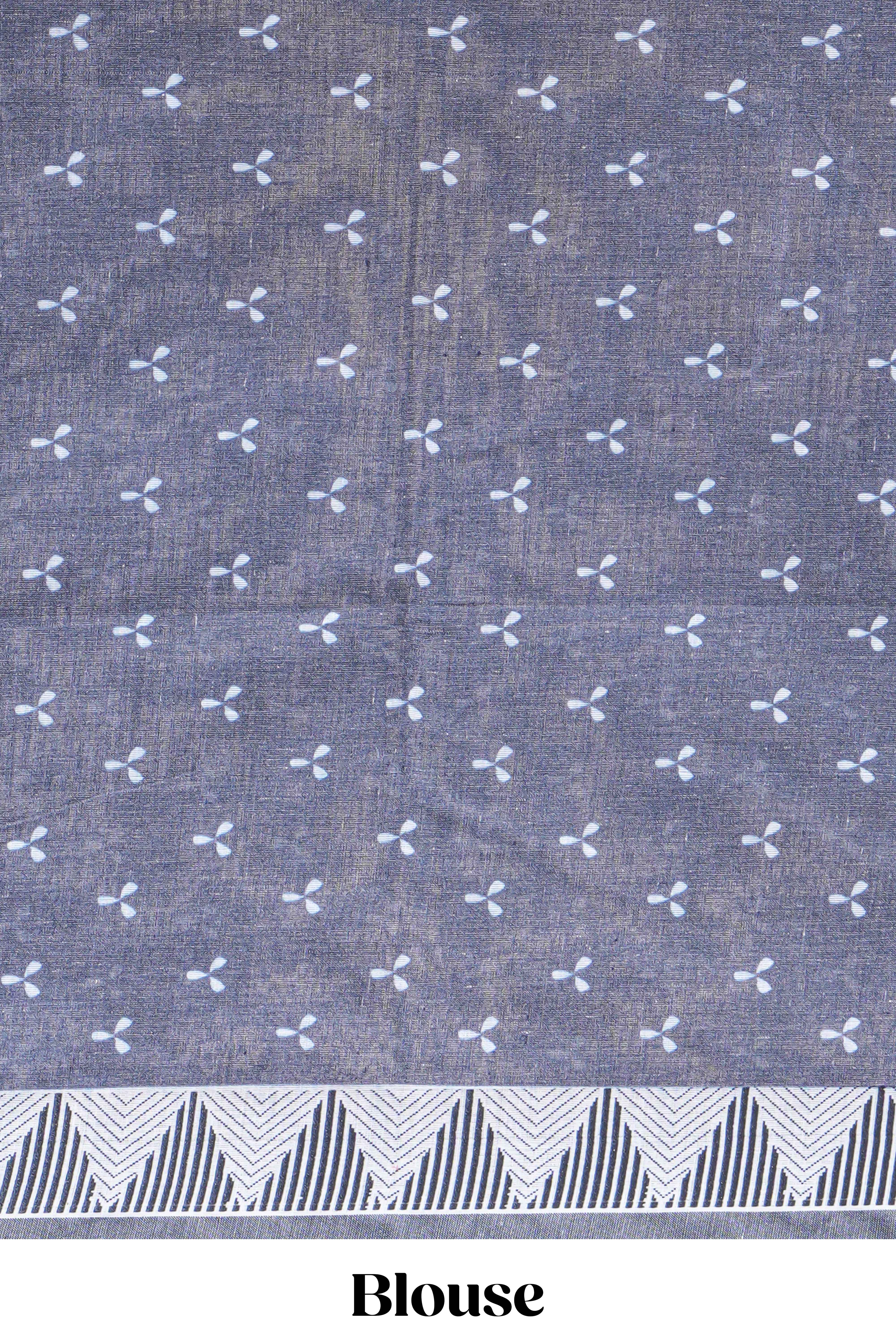 Brown linen small dotted elephant and floral motifs contrast border and printed pallu with geometric patterns and tassel detailing along with printed blouse