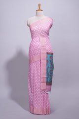 Pink linen saree white polka dot pattern all over the body and self zari border with printed pallu along with printed blouse