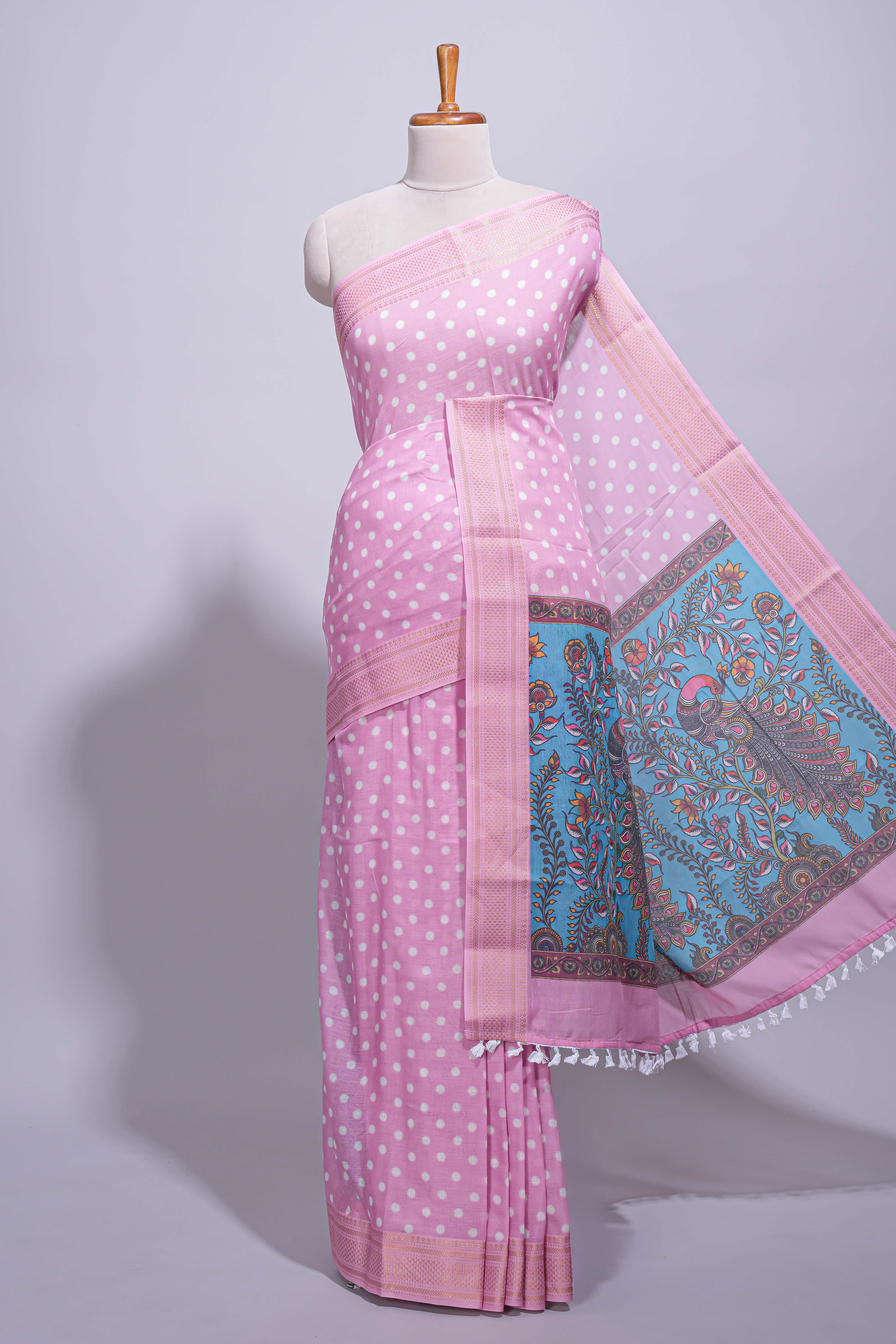 Pink linen saree white polka dot pattern all over the body and self zari border with printed pallu along with printed blouse