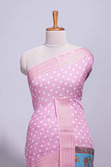 Pink linen saree white polka dot pattern all over the body and self zari border with printed pallu along with printed blouse