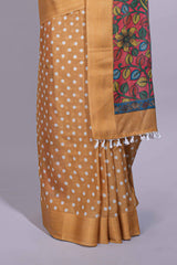 Mustard yellow linen saree white polka dot pattern all over the body and self zari border with printed pallu along with printed blouse