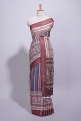 Maroon linen saree with vertical stripe patterns and traditional floral artistic motifs with intricate printed borders along with contrast blouse piece