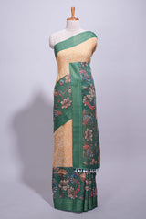 Linen saree with a mustard yellow and greenfeaturing floral patterns with a contrastfloral printed pallu and zari border with tassel