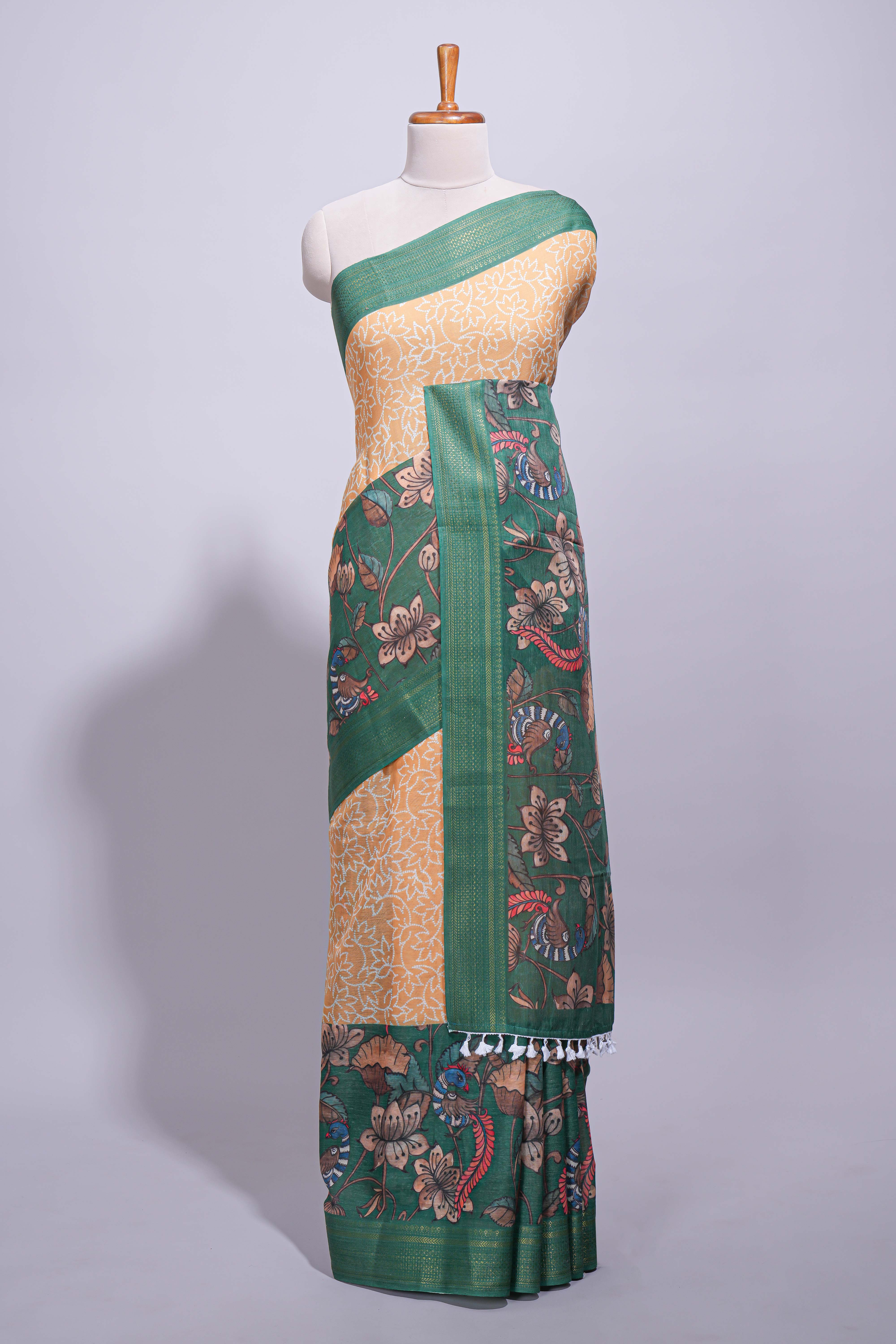 Linen saree with a mustard yellow and greenfeaturing floral patterns with a contrastfloral printed pallu and zari border with tassel