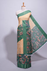 Linen saree with a mustard yellow and greenfeaturing floral patterns with a contrastfloral printed pallu and zari border with tassel