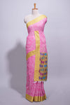 Pink linen saree with white dotted floral patterns with golden zari border and a multicolour pichwai motifs along with printed blouse