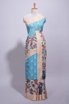 Linen saree with a blue with beige featuring floral patterns with a contrastfloral printed pallu and zari border with tassel
