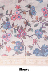 Linen saree with a blue with beige featuring floral patterns with a contrastfloral printed pallu and zari border with tassel
