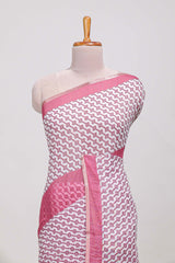 White and pink geomentric printed linen cotton saree with matching blouse and printed pallu