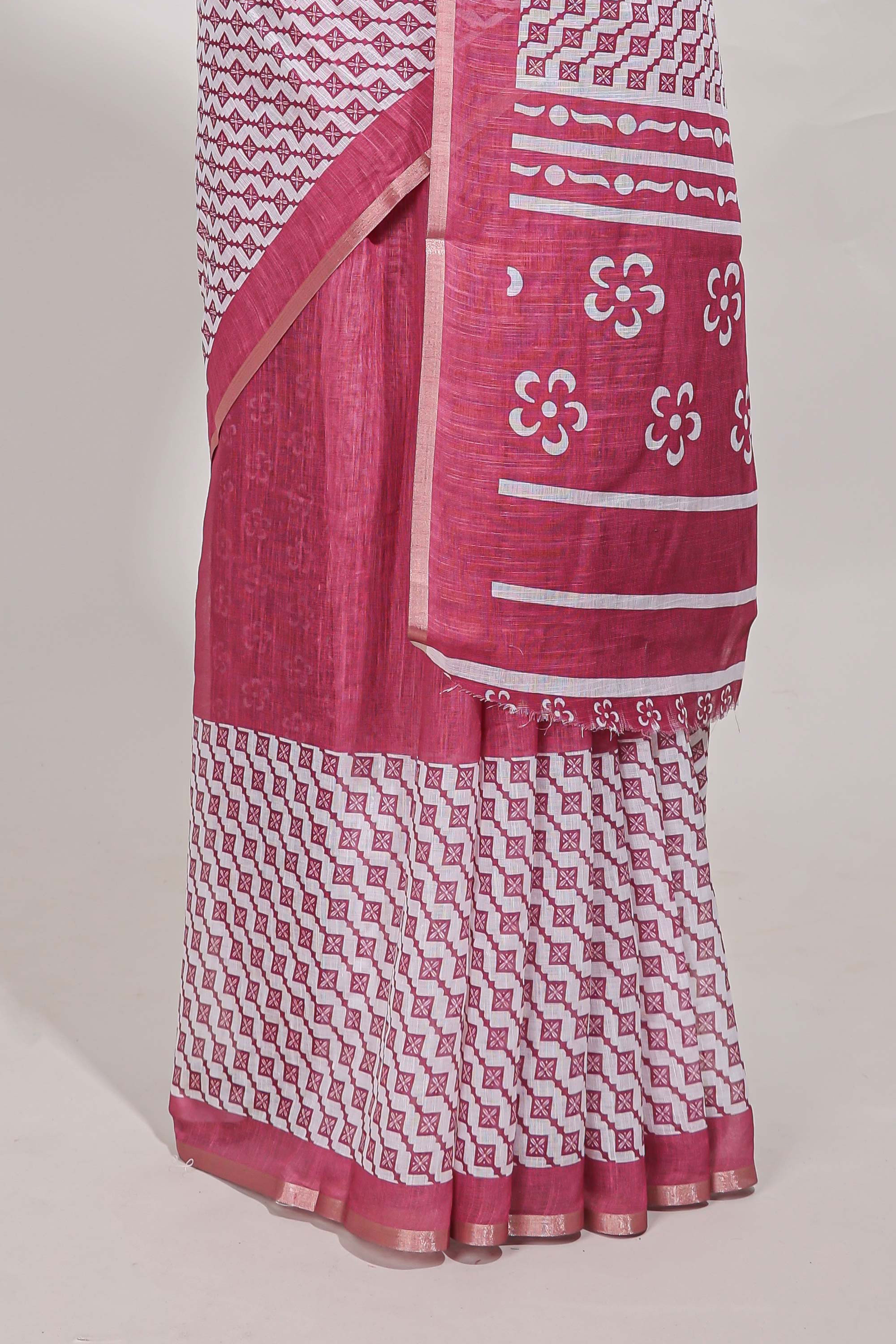 White and pink geomentric printed linen cotton saree with matching blouse and printed pallu