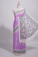 Lavender color linen saree with floral and geometric prints multicolour floral border andprinted pallu with tassels with a contrast blouse piece