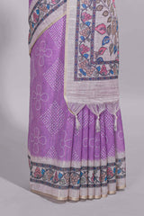 Lavender color linen saree with floral and geometric prints multicolour floral border andprinted pallu with tassels with a contrast blouse piece