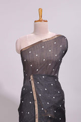 Black round motifs linen saree with self zari border and contrast checked blouse
