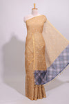 Sandal round motifs linen saree with self zari border and contrast checked blouse