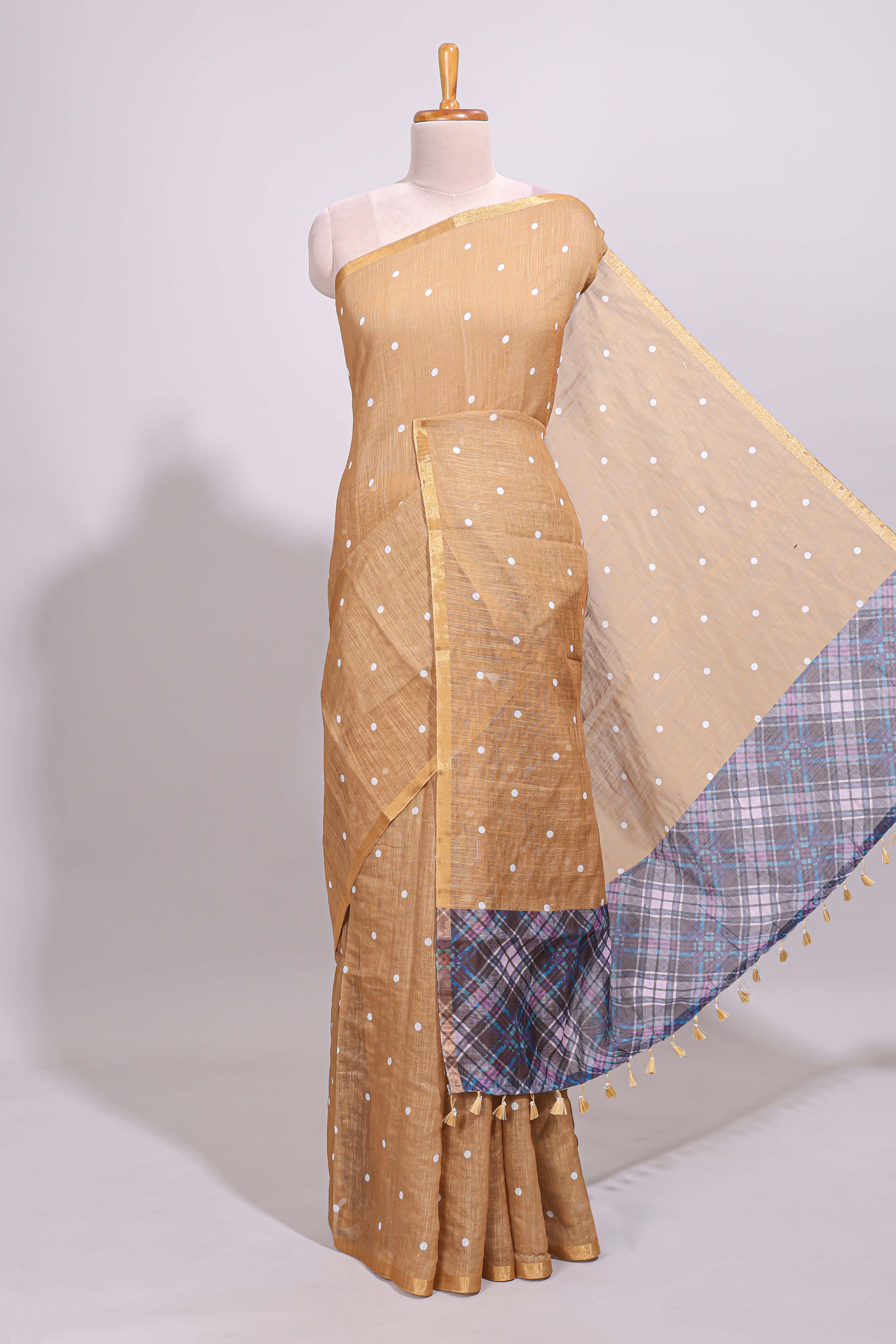Sandal round motifs linen saree with self zari border and contrast checked blouse
