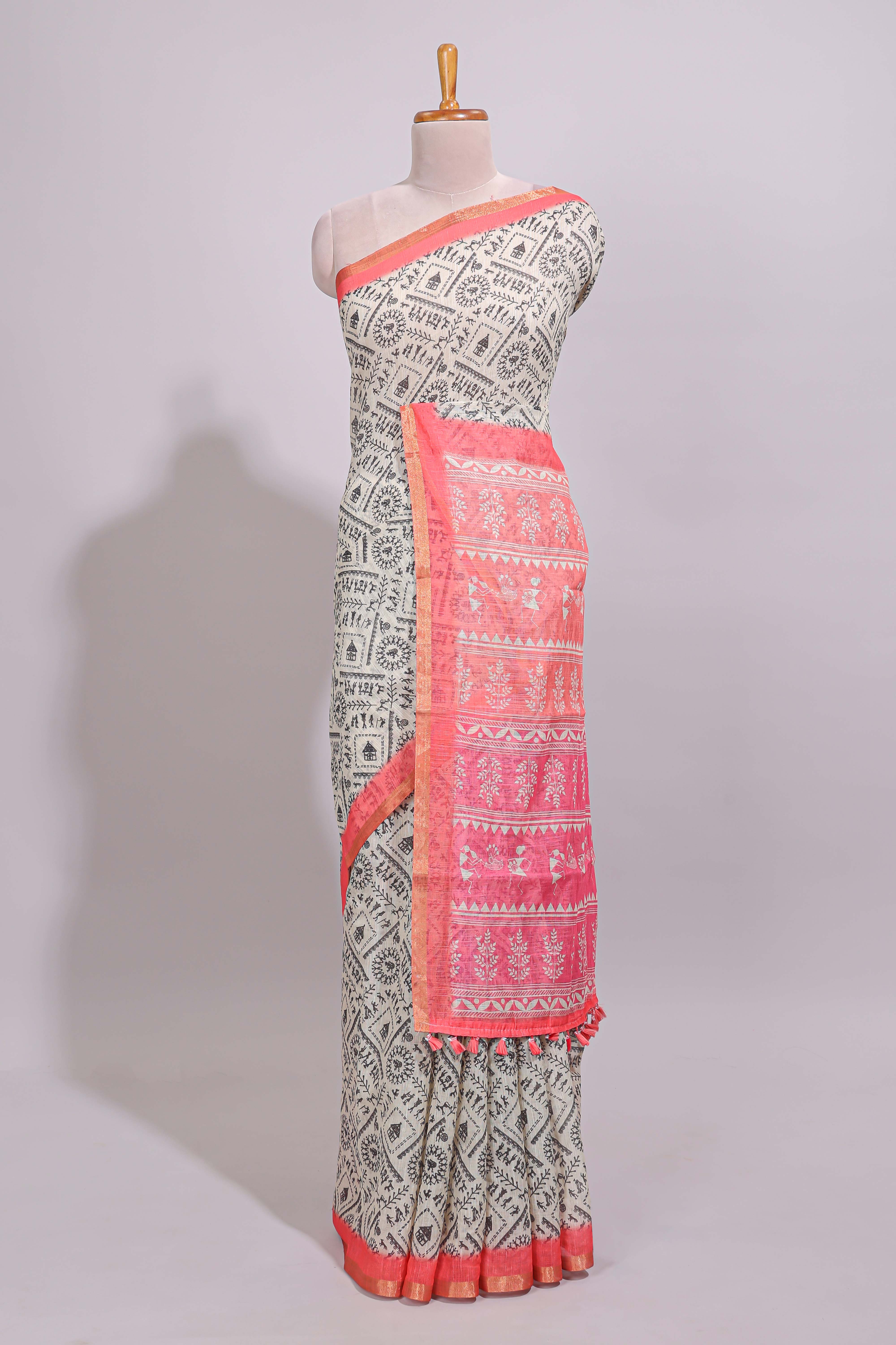 Cream warli design linen cotton saree with contrast zari border and contrast printed blouse