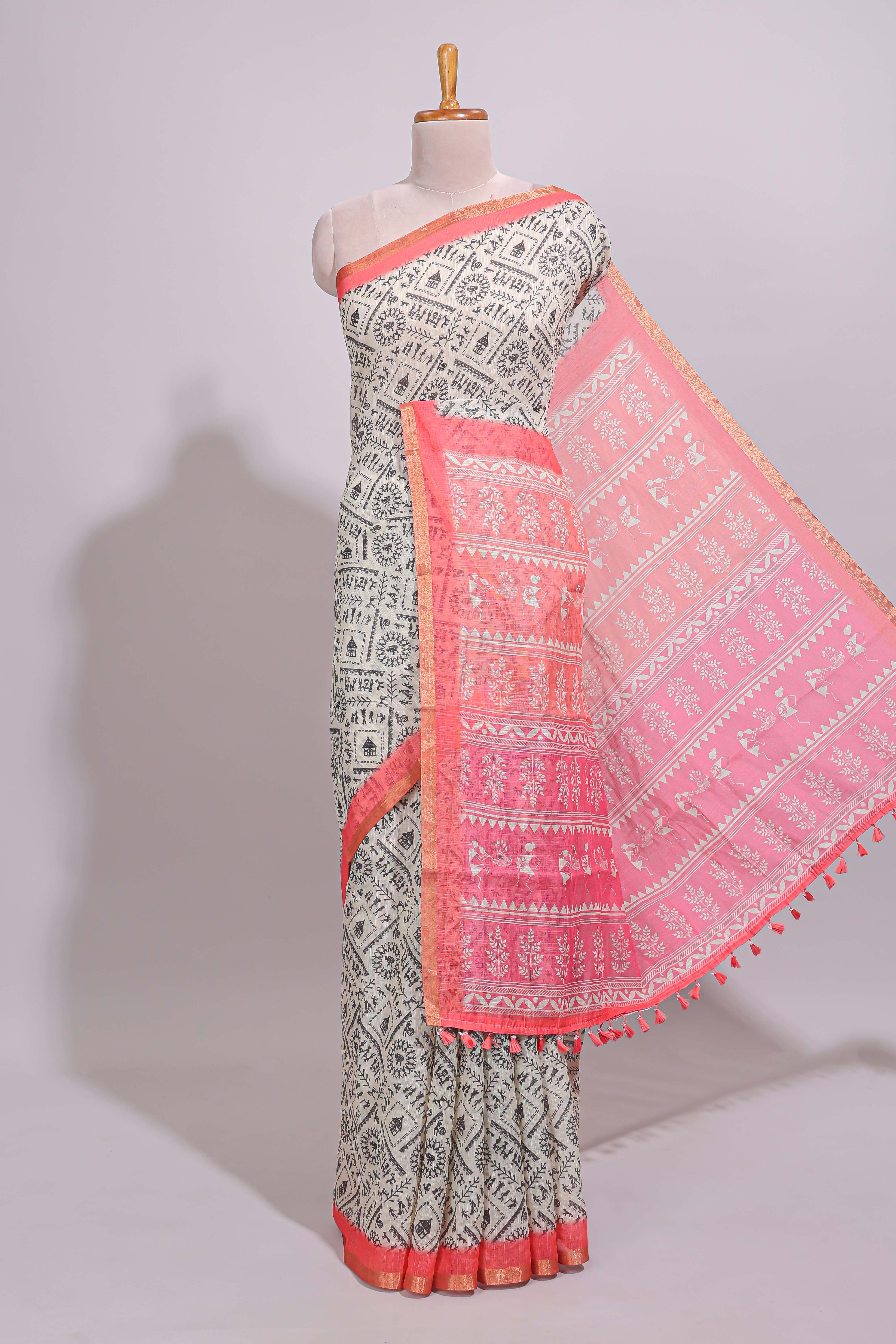 Cream warli design linen cotton saree with contrast zari border and contrast printed blouse