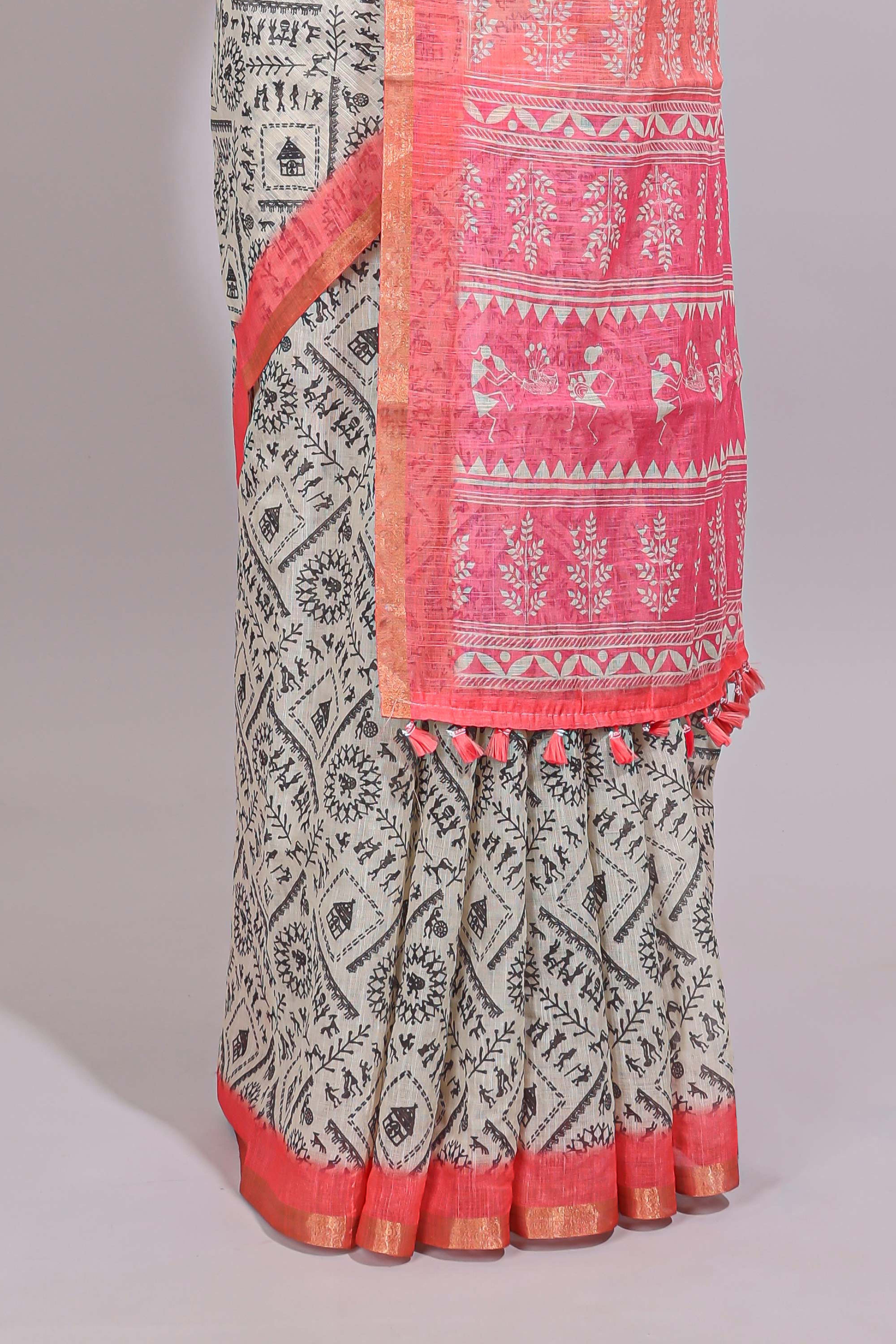 Cream warli design linen cotton saree with contrast zari border and contrast printed blouse