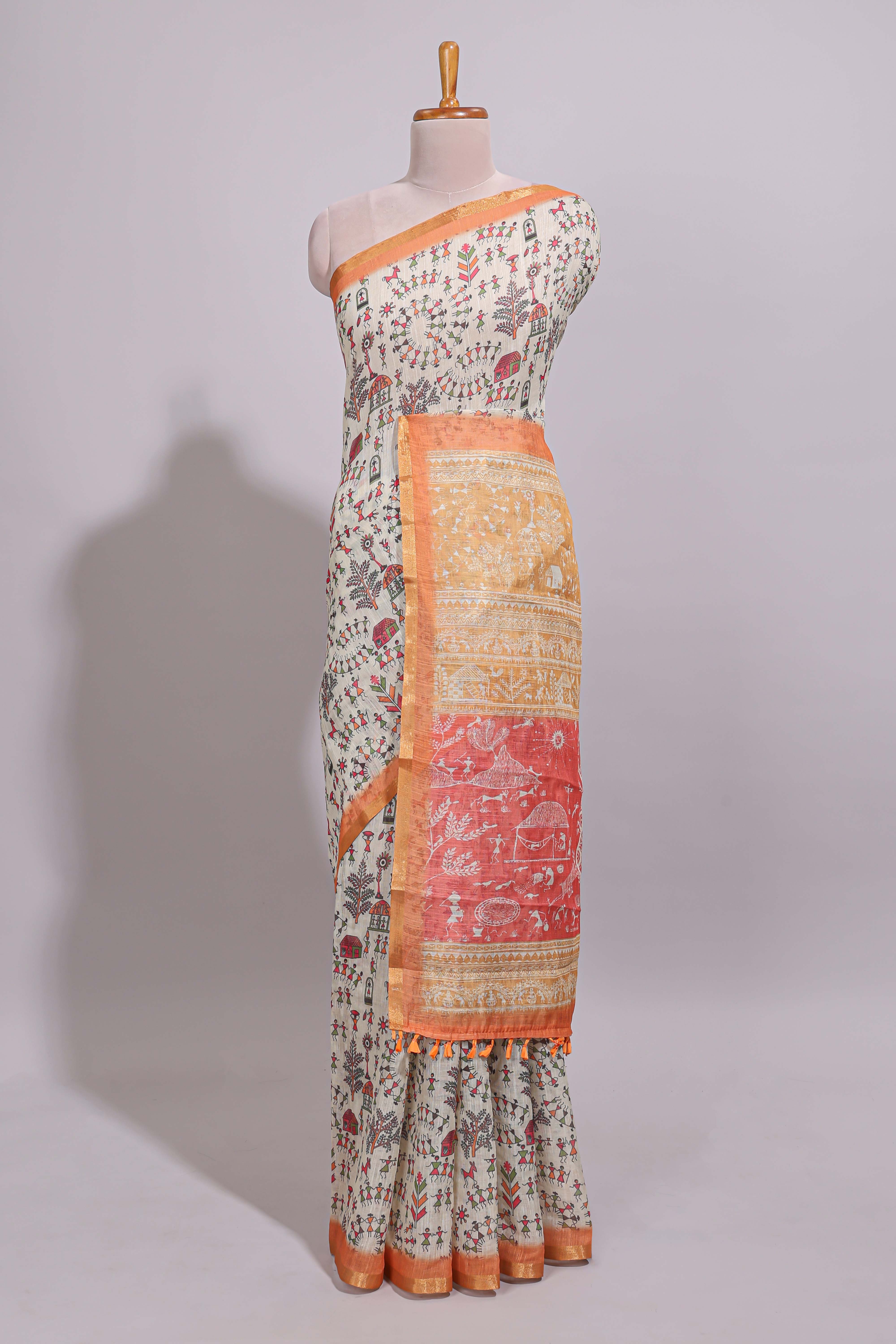 Cream warli design linen cotton saree with contrast zari border and contrast printed blouse