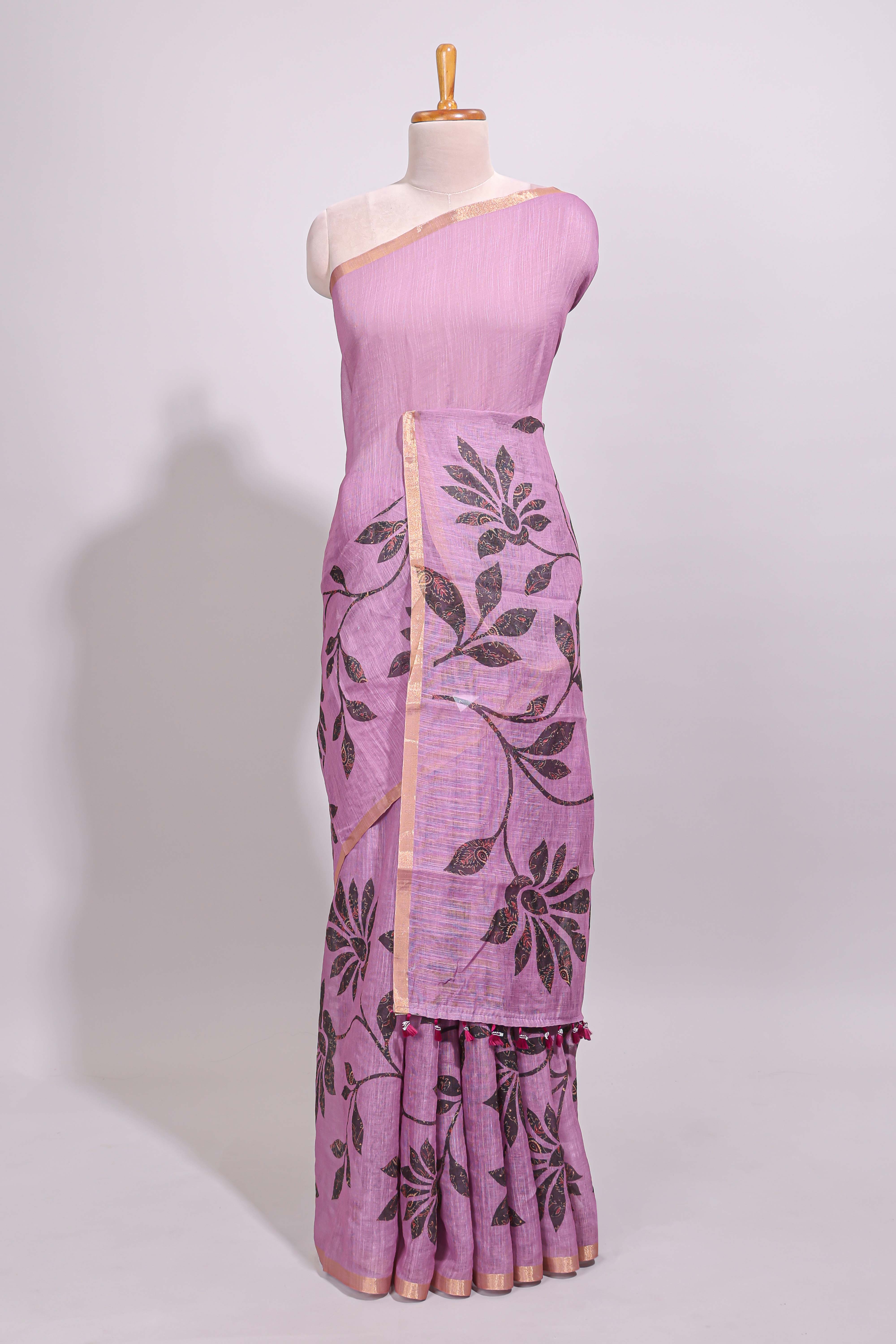 Mauve floral design linen cotton saree with self zari border and contrast floral print blouse