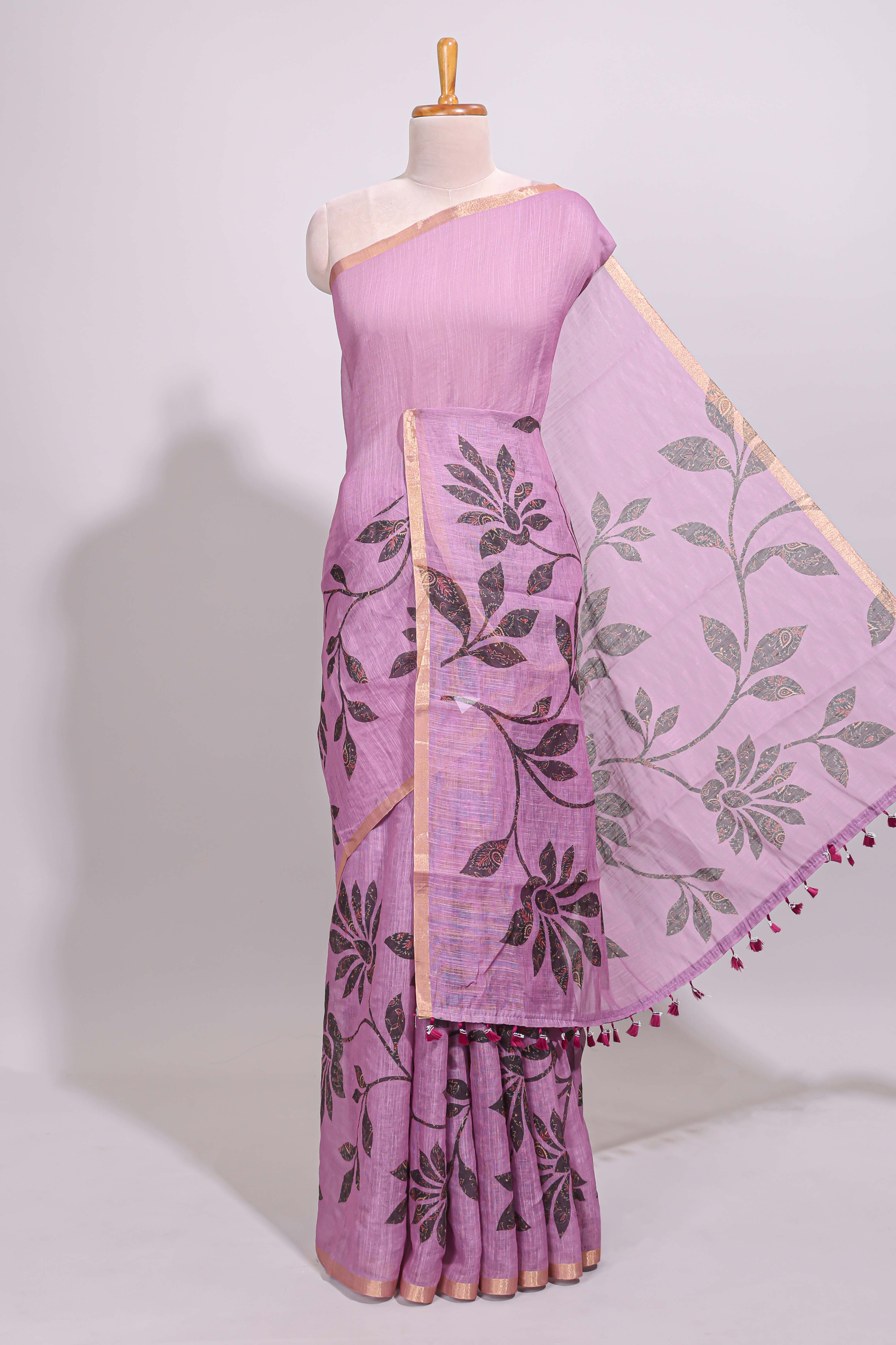 Mauve floral design linen cotton saree with self zari border and contrast floral print blouse