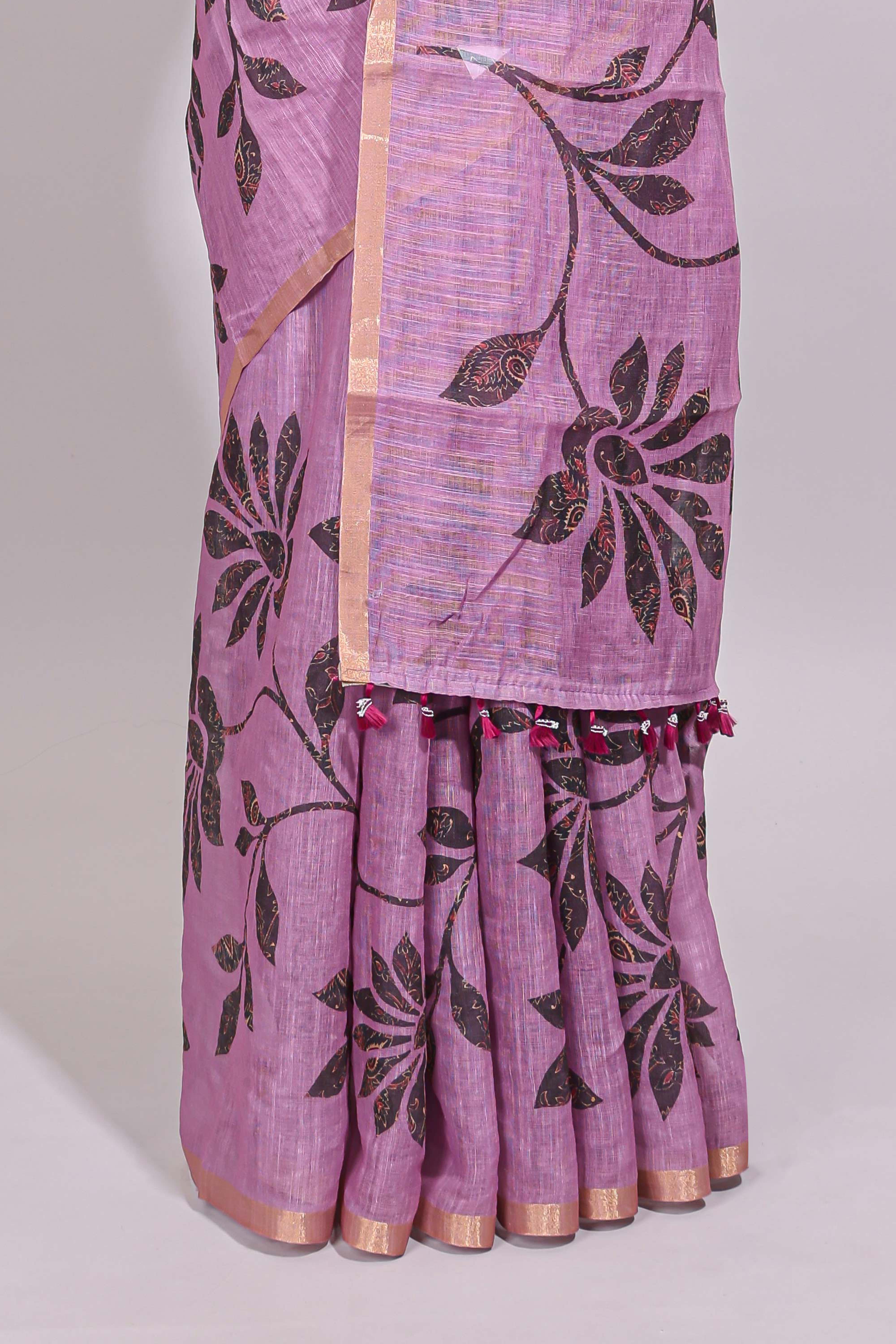 Mauve floral design linen cotton saree with self zari border and contrast floral print blouse