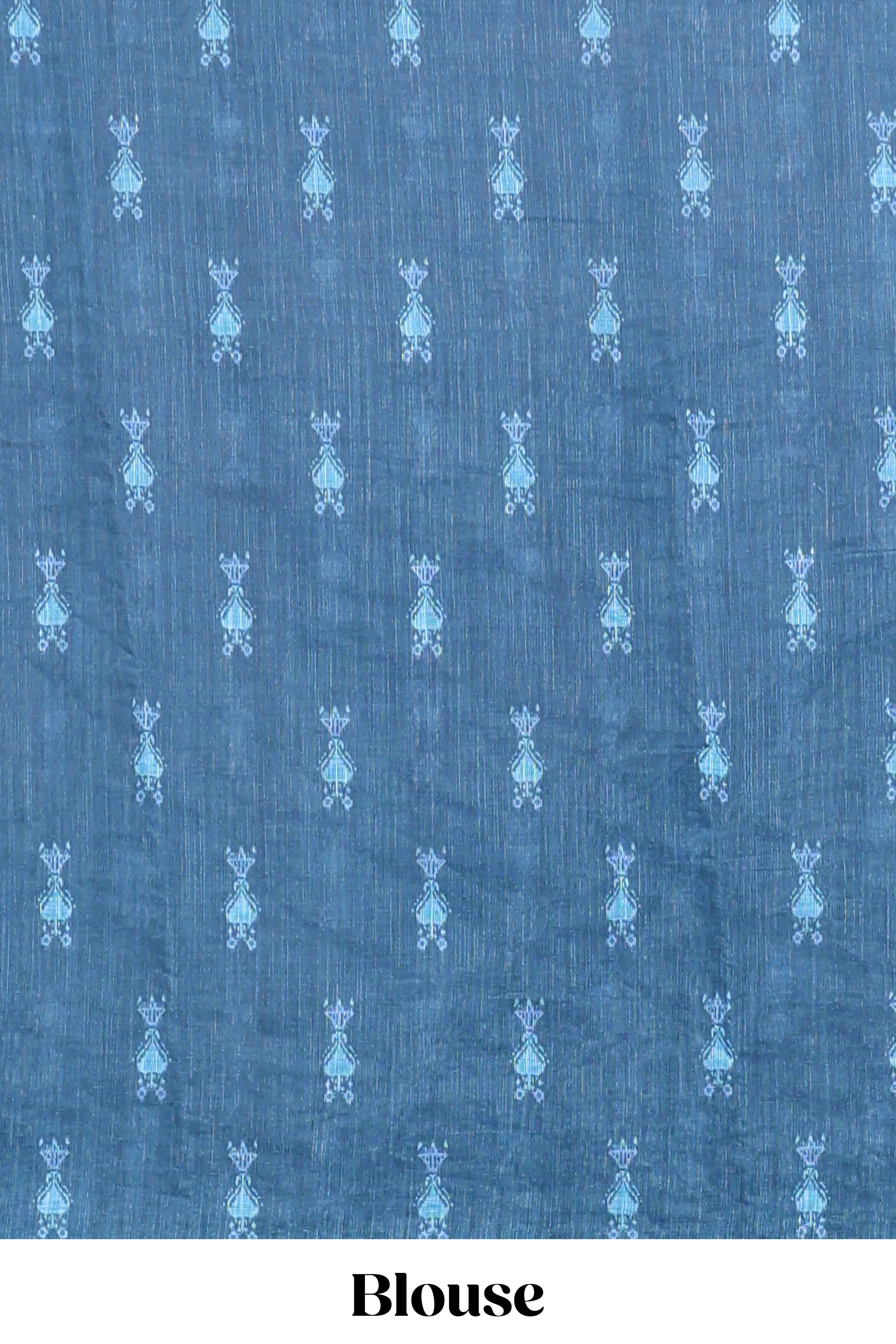 Blue geometric ikkat design linen cotton saree with contrast zari border and printed blouse