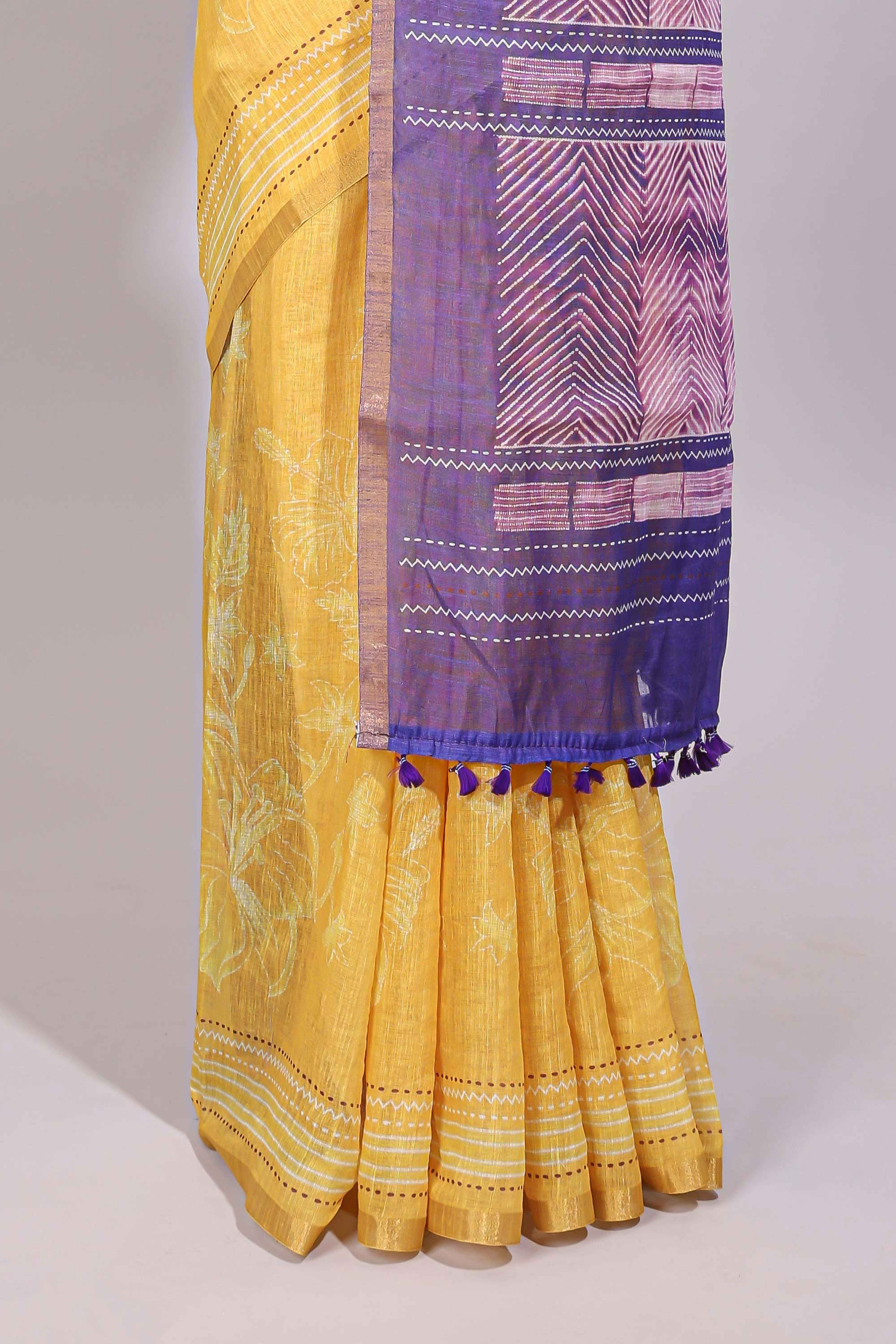Yellow floral design linen cotton saree with self zari border and contrast printed blouse