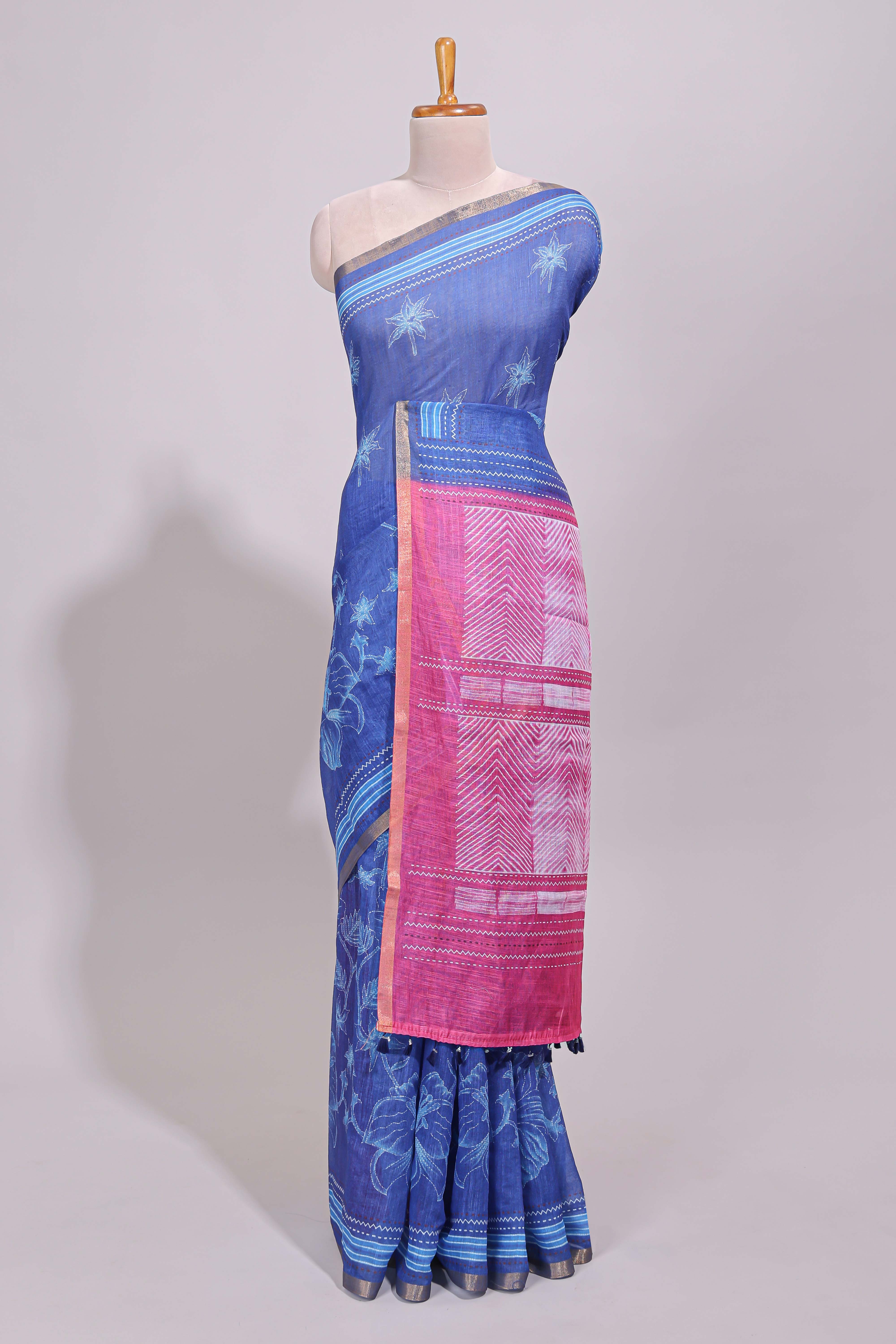 Blue floral design linen cotton saree with self zari border and contrast printed blouse