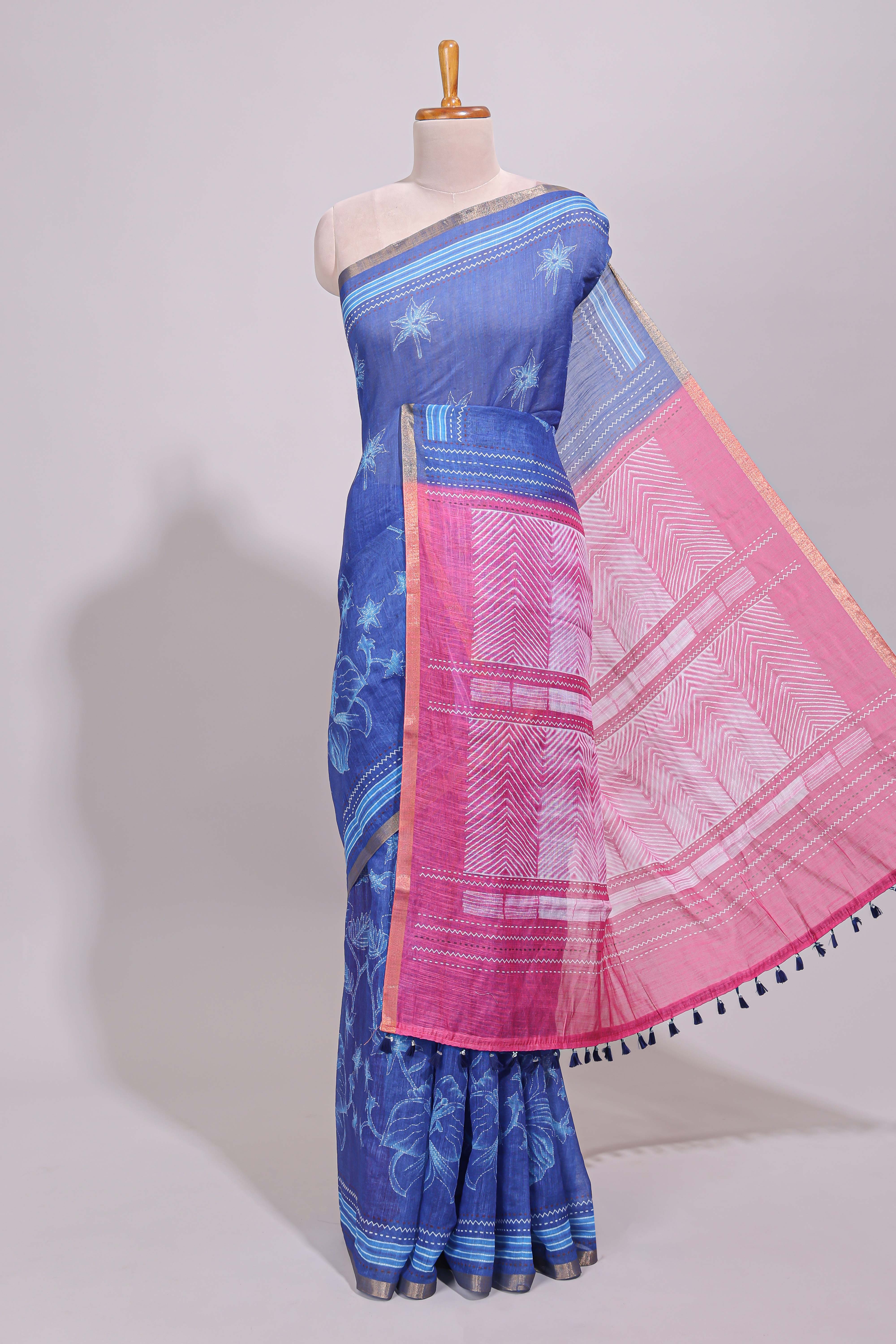 Blue floral design linen cotton saree with self zari border and contrast printed blouse