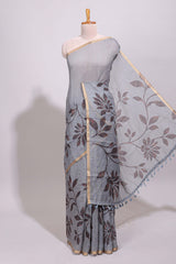 Grey floral design linen cotton saree with self zari border and contrast printed blouse