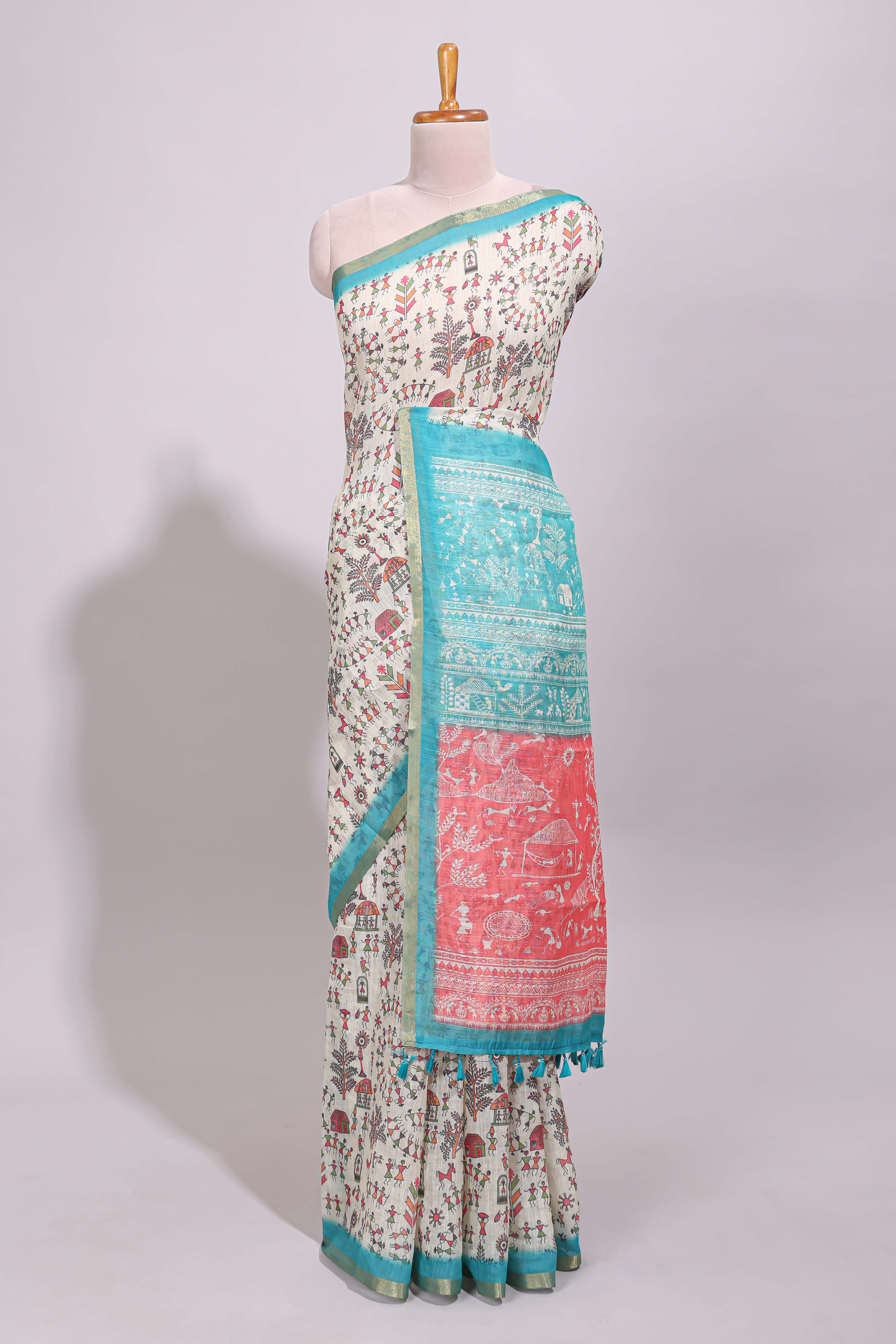 Cream warli design linen cotton saree with contrast zari border and printed blouse