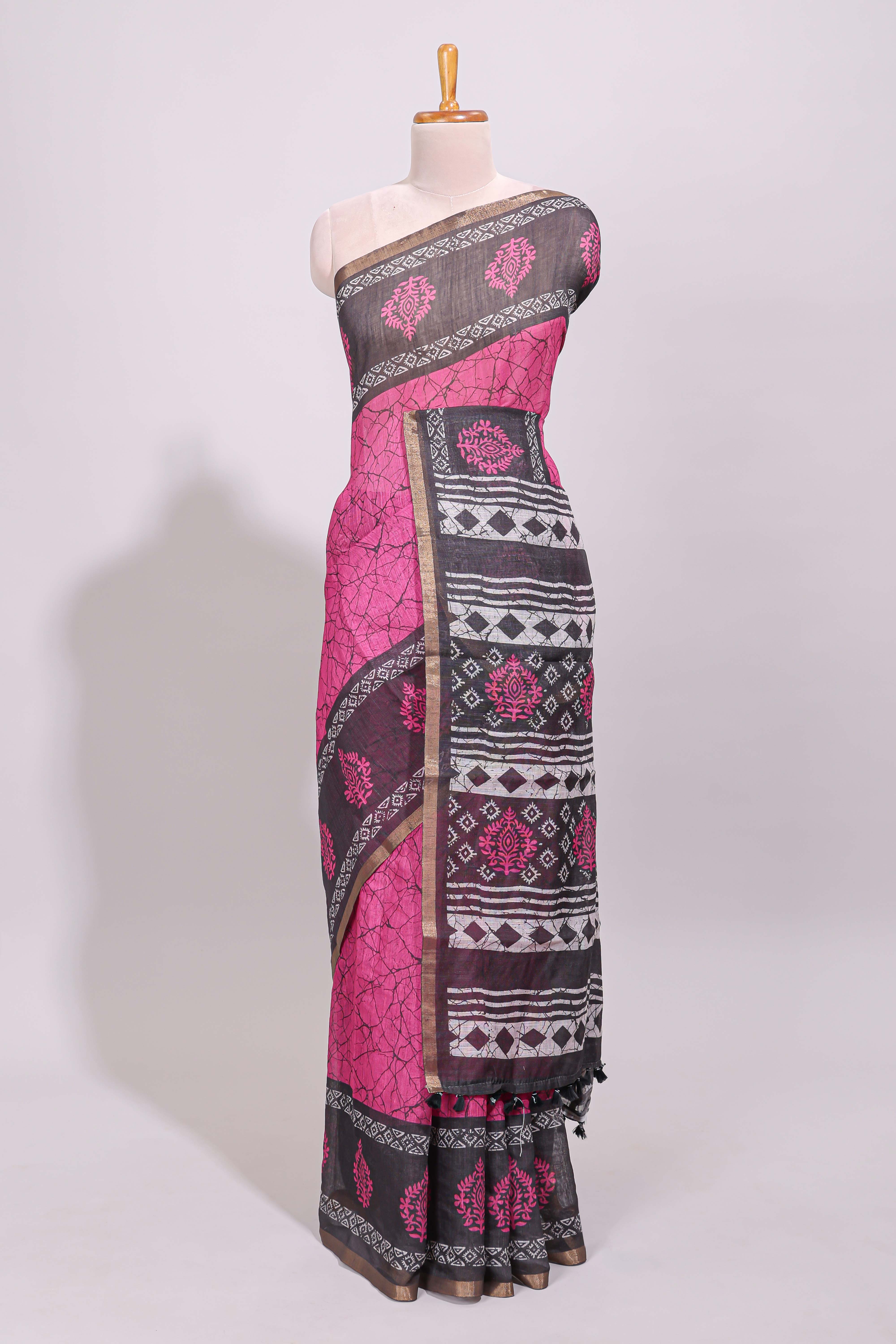 Pink crack design linen cotton saree with contrast zari border and printed blouse