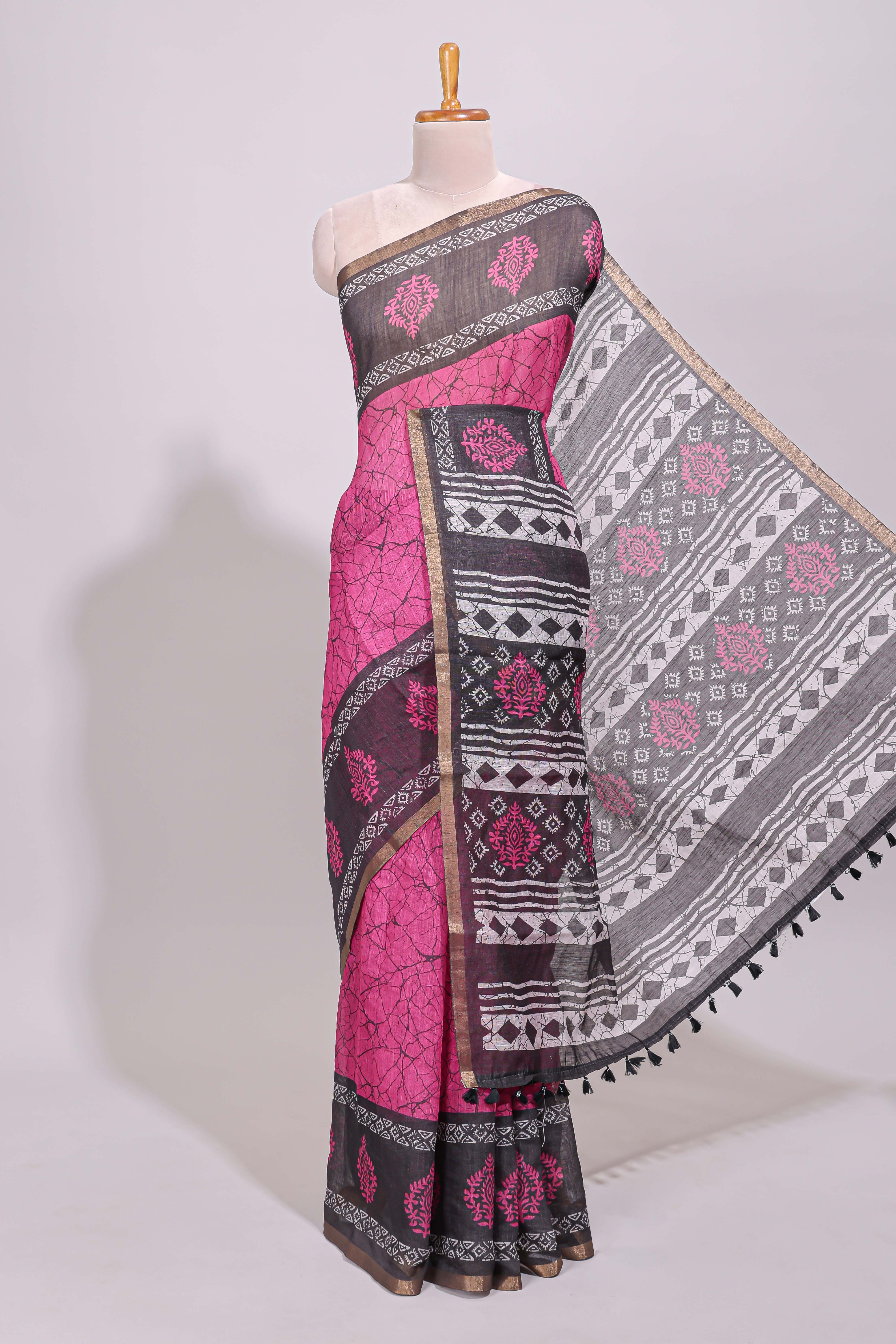 Pink crack design linen cotton saree with contrast zari border and printed blouse