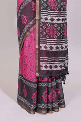 Pink crack design linen cotton saree with contrast zari border and printed blouse