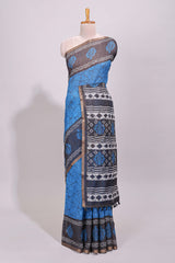 Blue crack design linen cotton saree with contrast zari border and printed blouse