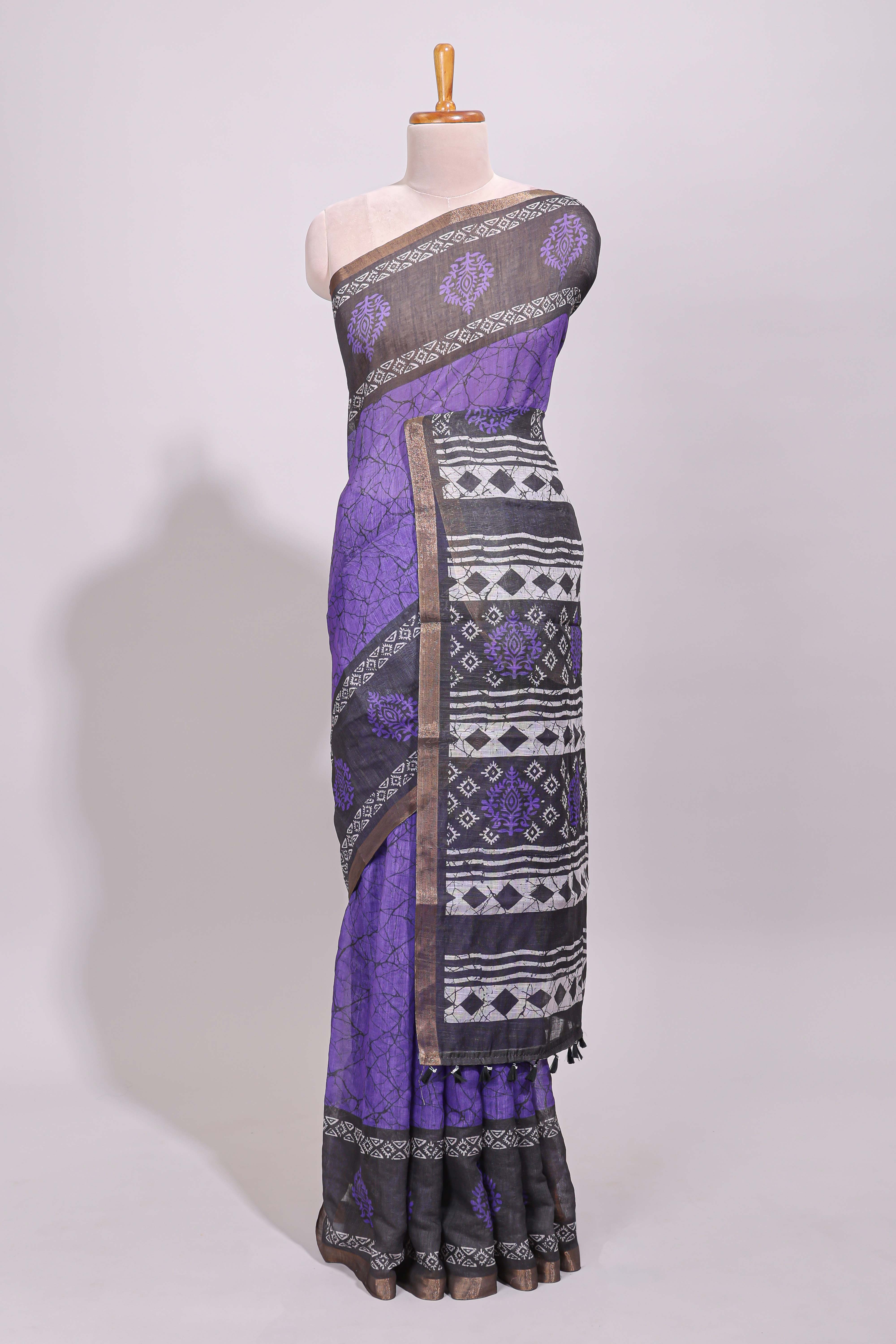 Violet crack design linen cotton saree with contrast zari border and printed blouse