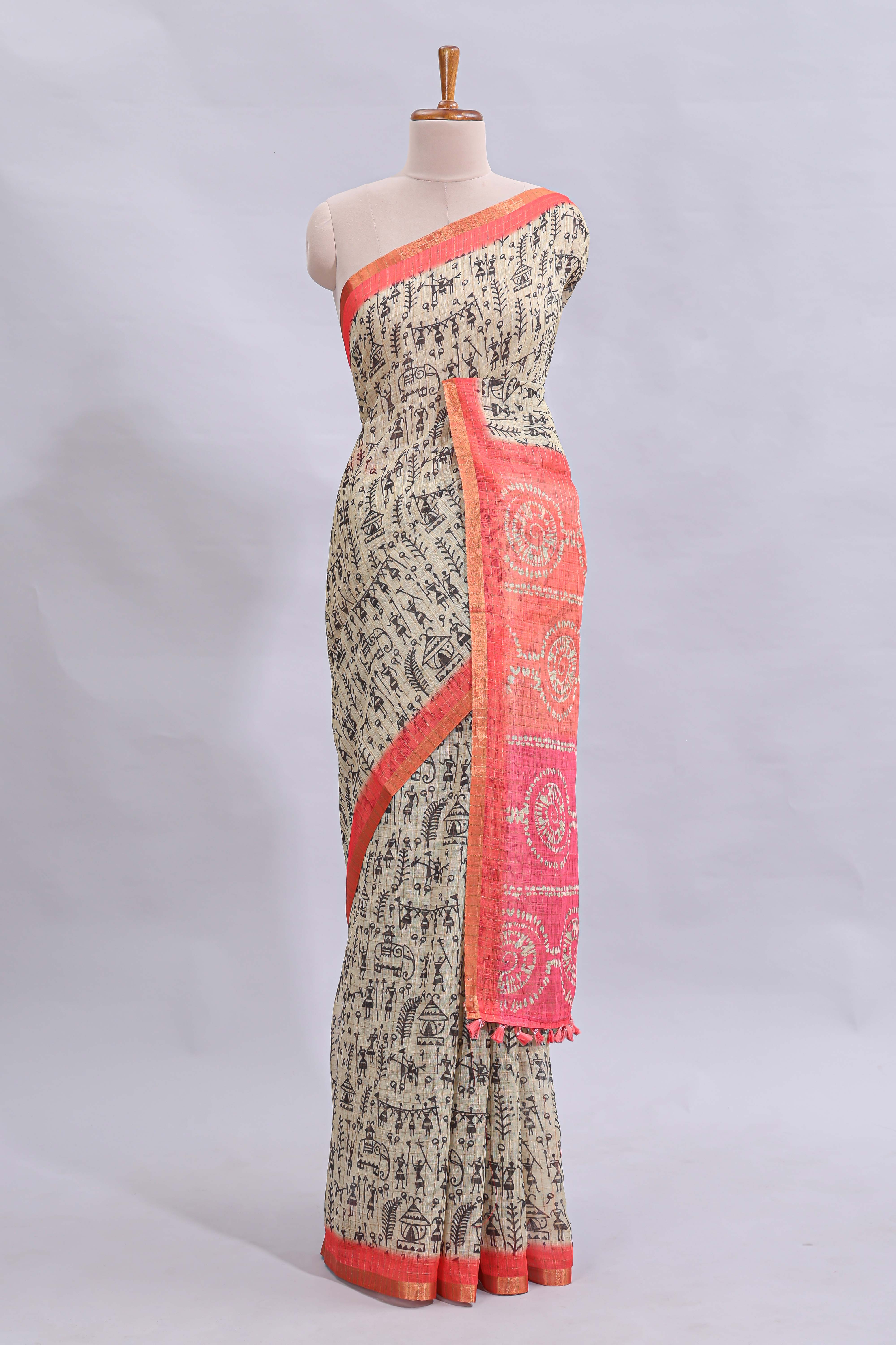 Beige tribal design warli print linen cotton saree with contrast pink zari border and chevron design blouse