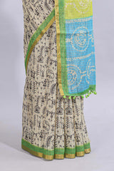Beige tribal design warli print linen cotton saree with contrast green zari border and chevron design blouse