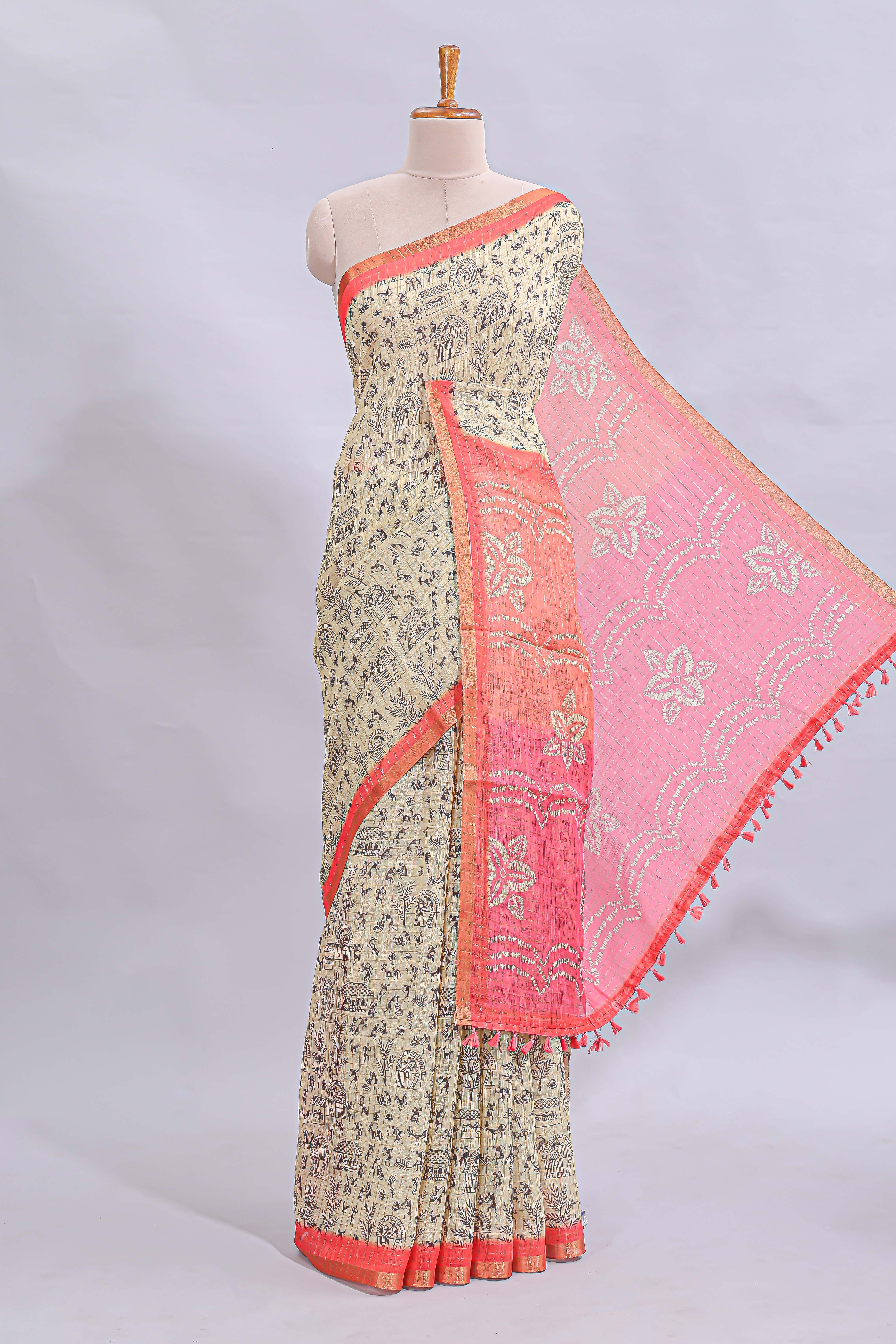 Beige tribal design warli print linen cotton saree with contrast pink zari border and floral design pallu