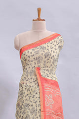 Beige tribal design warli print linen cotton saree with contrast pink zari border and floral design pallu